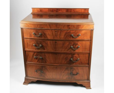 A 19th Century mahogany bow fronted chest of four graduating drawers, each having drop handles, all on shaped bracket feet, h