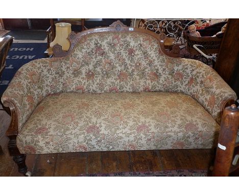 Victorian inlaid mahogany upholstered sofa with downswept arms standing on turned feet, 64" wide
