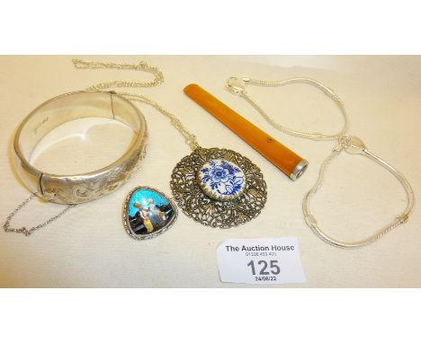 Assorted jewellery inc. silver bangle marked for Birmingham with silver chain, two silver charm bracelets with amber cigarett