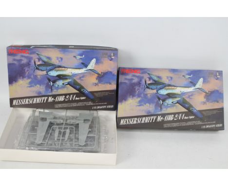 Meng - Two boxed Meng #LS-001 1:48 scale Messerschmitt Me-410B-2/Uf Heavy Bomber plastic model kits. One is presumed Mint bei