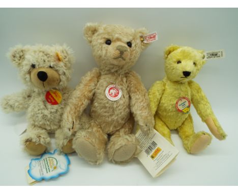 Steiff - three Bears comprising Classic Teddy 28 cm (h), a replica 1948 Bear 24 cm (h), and further Bear named Charlie, 23 cm