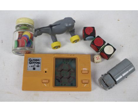 Mattel - Guttang Gottong - Matchbox - A rare 1982 Mattel Guttang Gottong hand held game, we have tried batteries in it and th