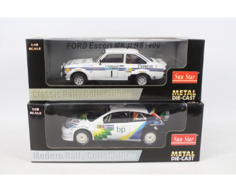 Sun Star - 2 x 1:18 scale Ford Rally Cars, Escort MkII RS1800 1977 Lombard RAC Rally car driven by Roger Clark # 4434 and a 2