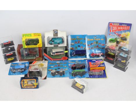 Corgi - Matchbox - Base Toys - Oxford - A group of 26 x boxed / carded models including 1933 Ford Coupe, Thames Flatbed lorry