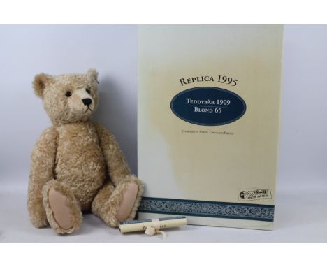 Steiff - a British Collector's 1909 Replica Teddy Bear with Growler, mohair plush, 65 cm (high) issued in a Limited Edition w