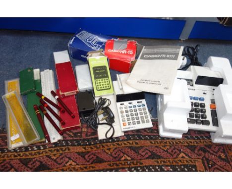 A VINTAGE CASIO ELECTRIC CALCULATOR FR-1011 (boxed) a Casio HR-15 calculator and similar items