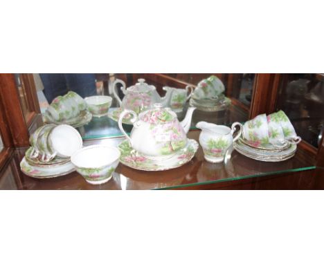 A ROYAL STANDARD, "SPRING'S GIFTS" TEASET and a Royal Albert "Blossom Time" teapot 