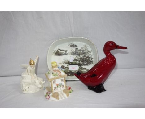 A ROYAL DOULTON 'FLAMBE' DUCK, a Royal Doulton bone china figure 'Magic Dragon' no. HN2977, modelled by Adrian Hughes as part