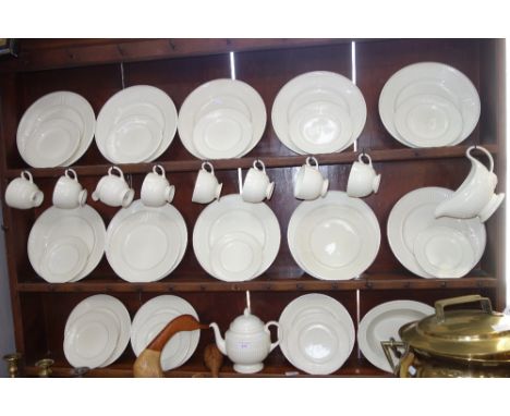 A WEDGWOOD "EDME" CREAM DINNER AND TEA SERVICE