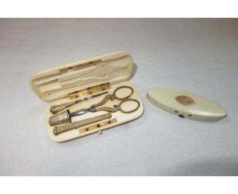 A 19TH CENTURY CONTINENTAL SEWING ETUI/NECESSAIRE, the ivory case fitted with a gilt metal needle case, thimble, scissors, an