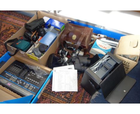 A COLLECTION OF CAMERAS and camera equipment