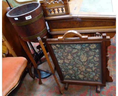 A EDWARDIAN OAK AND BRASS BOUND PLANT STAND and a similar fire screen 