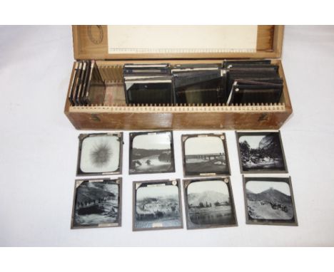 A COLLECTION OF LATE 19TH CENTURY BLACK AND WHITE MAGIC LANTERN SLIDES, to include scenes of explorations of the Himalayas an