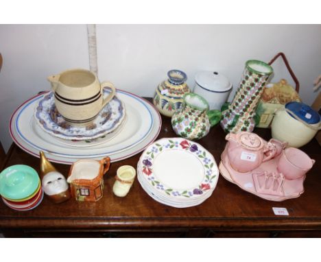 A VINTAGE PINK CERAMIC BREAKFAST SET, circa 1930s with a toast rack, a cottage biscuit barrel and similar ceramics