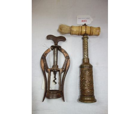 A 19TH CENTURY THOMASON TYPE DOUBLE ACTION CORKSCREW, turned bone handle with brush, the brass barrel decorated with fruits, 