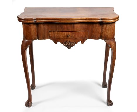 A George III mahogany serpentine gate leg card table, fold over top above single drawer to frieze, drawer to side on cabriole