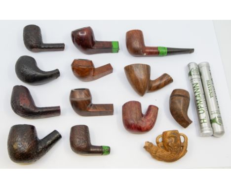 Eric Morecambe's pipes. 33 bowls and a quantity of stems, all well-smoked, including Meerschaum and briar. [Eric broke a pipe