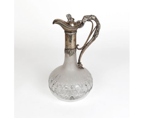 A Victorian cut glass and silver plate claret jug, the handle cast with grapes and vine leaves with pull mechanism, the cover