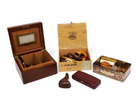 Eric Morecambe's smoking accessories, comprising a cigar humidor, lacking key but unlocked, housing a cigar-holder and two pi