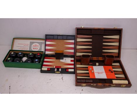 A collection of games to include two backgammon games in carry cases (complete) one designed in Sweden by Philip along with 1