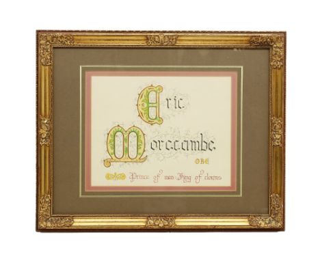 A 20th Century calligraphy presentation work on paper, gilt heightened which reads: ERIC MORECAMBE O.B.E Prince of men King o