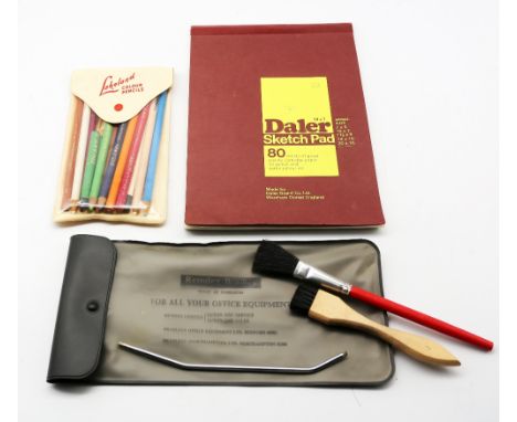 A sketch pad with drawings by Eric Morecambe, including depictions of a fiddle player, a wren, and an F1 car (signed), around