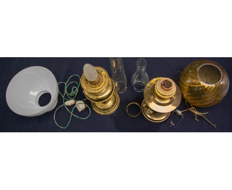 An early 20th Century Duplex oil lamp with amber glass shade, electrified and an Aladdin 23 oil lamp with white shade (2)   ❧