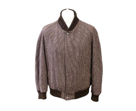 A 1960s beige/ brown check wool Sports Jacket with a knitted collar and cuff, two slit pockets, a bomber jacket style hemline