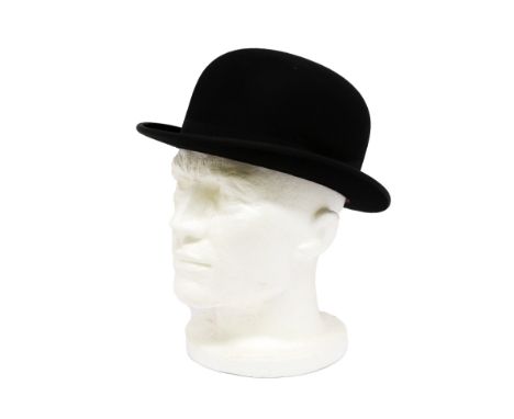 Eric Morecambe's stage props. A bowler hat by Woodrow Amylite, internal band bearing "E.M." studs  ❧ This is from Eric Moreca