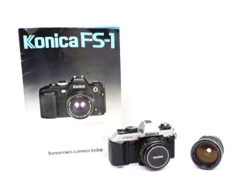 A 1970s Konica FT-1 motor automatic camera along with an Hanimar automatic lense in case, one of Eric's personal cameras from