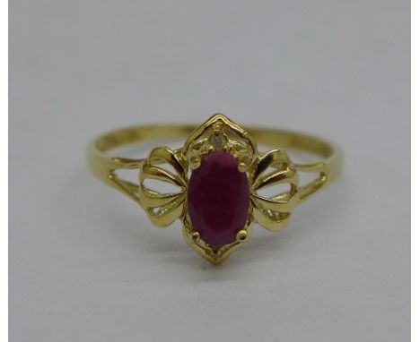 A 9ct gold, ruby and diamond ring, 1.1g, O