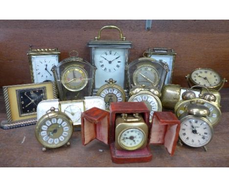 Four Schatz carriage clocks, one other carriage clock, a Cyma alarm clock and nine other clocks, (15)