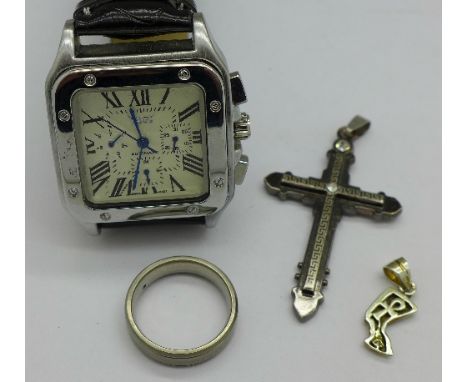 A gentleman's wristwatch, a cross pendant, a charm and a titanium ring