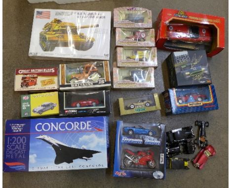 A collection of model vehicles including Ixo Aston Martin, four Corgi London scene, a Britains tractor, Corgi 007, Matchbox J