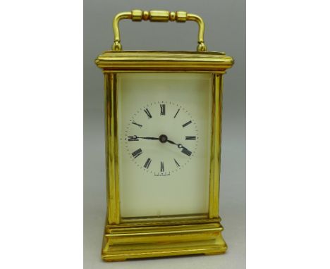 An English brass cased carriage clock, St. James, London, 12.5cm