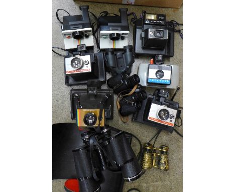 Four pairs of binoculars and cameras including Polaroid, etc.