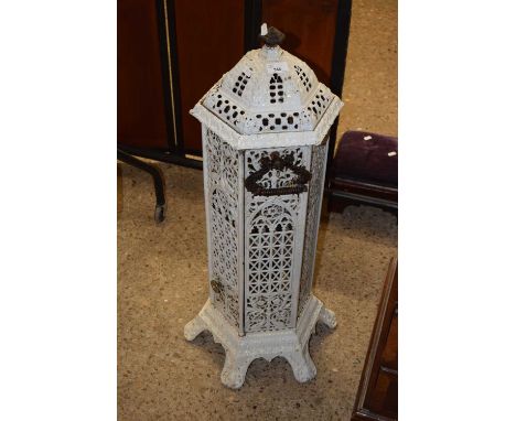 An iron framed oil heater of architectural form