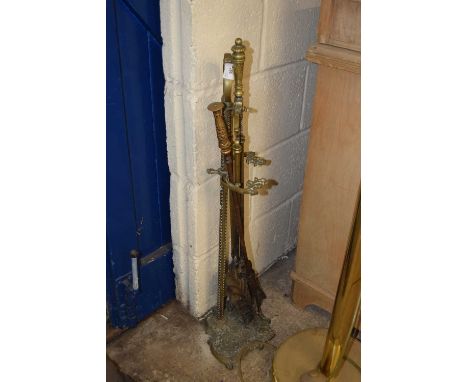 Set of brass fire tools and stand