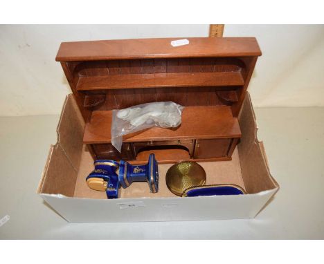 A dolls house bathroom suite and dresser plus a further powder compact