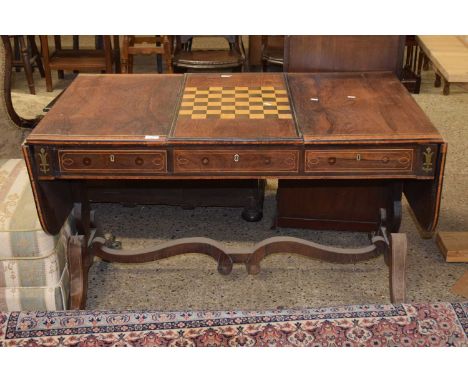 A Georgian rose wood and brass inlaid sofa table with reversible games centre section, sold for restoration