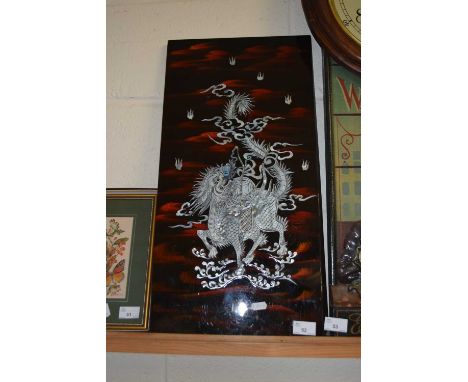 Modern Chinese mother of pearl lacquered panel depicting a dragon