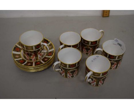 A Royal Crown Derby pattern 1128 group of six coffee cups and saucers