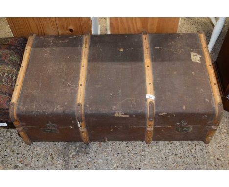 A wood framed steamer trunk