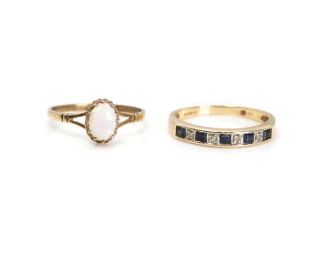 A 9ct gold opal ring and a sapphire and diamond half eternity ring, the 9ct gold opal ring claw set with an oval opal cabocho