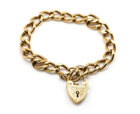 A 9ct gold curb link bracelet, with solid curb links, to safety chain and incised heart shaped padlock, approximately 170mm l