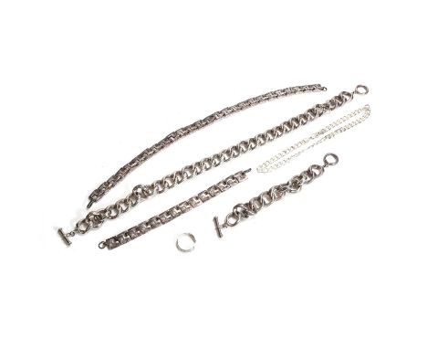 A platinum ring and a group of silver jewellery, a platinum engraved band ring,cut open, London 1995, and a group of silver j