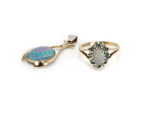 A 9ct gold opal cluster ring and a silver gilt opal triplet pendant, the ring with an oval opal cabochon, to a surround of ro