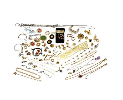 A large collection of costume jewellery, to include a faux pearl penguin brooch, a faux pearl penguin pin, a rope link chain 