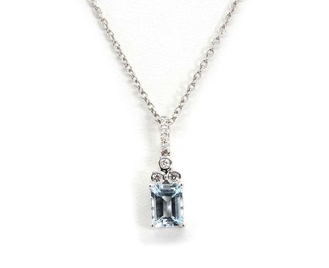 An 18ct white gold aquamarine and diamond pendant and chain, with a rectangular step cut aquamarine in a four claw setting, t
