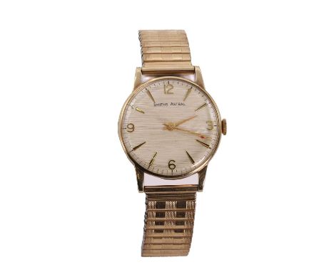 A gentlemen's 9ct gold Smiths Astral mechanical bracelet watch, with a 30mm diameter case with inscription verso, a textured 